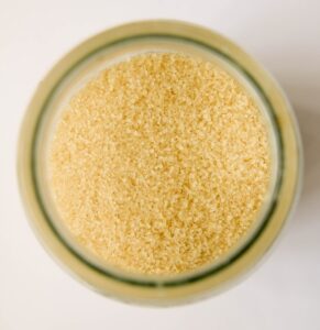 Brown sugar in a jar which if excessively taken could negatively impact teeth health